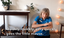 Picture of Linda from Tura Library making mouse movements with her hands